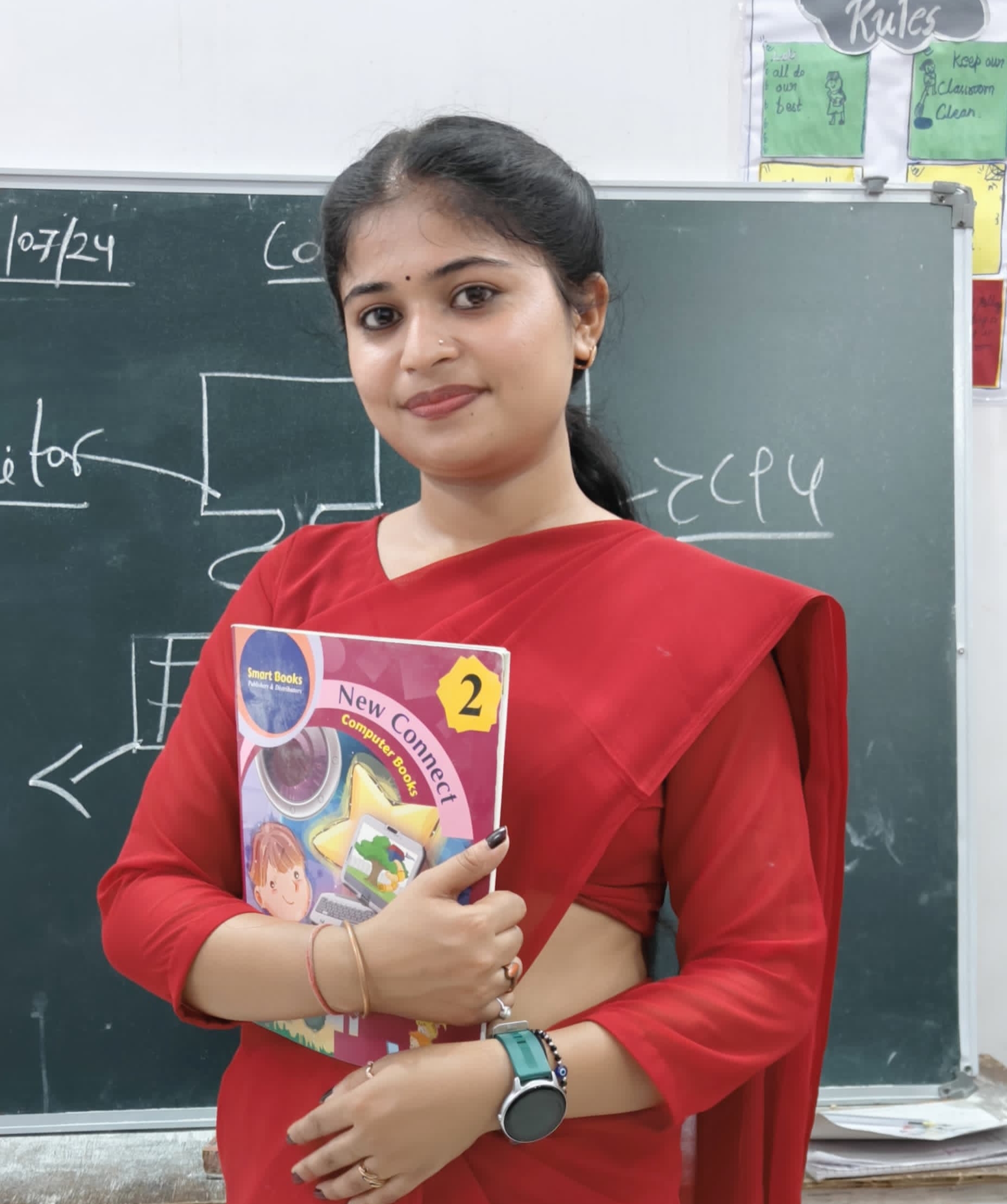 Riya mam holding book