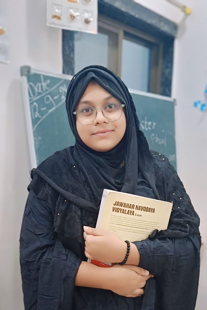 Fazila Mam Holding Book
