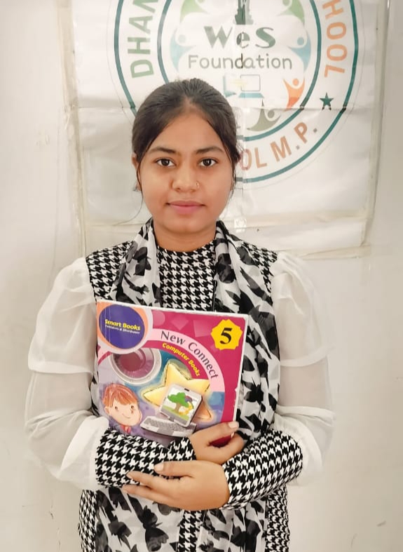 Muskan Mam Holding Book