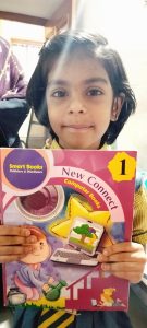 Alisha Class 1 st Student Holding Book
