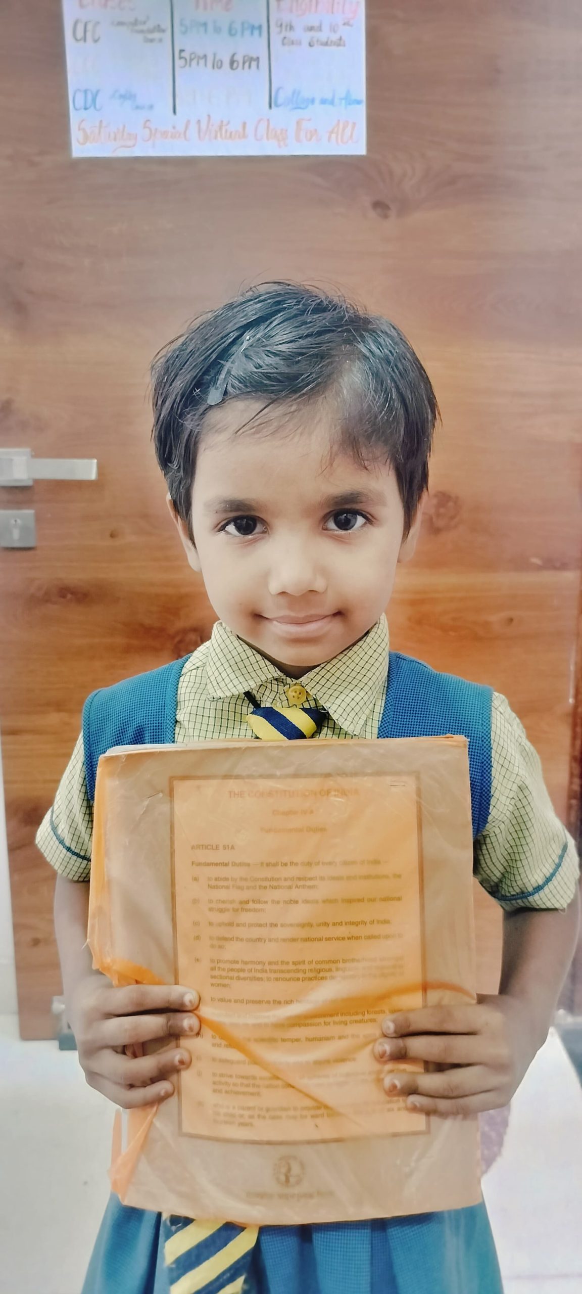 Amayra Class 1st Student Holding Book