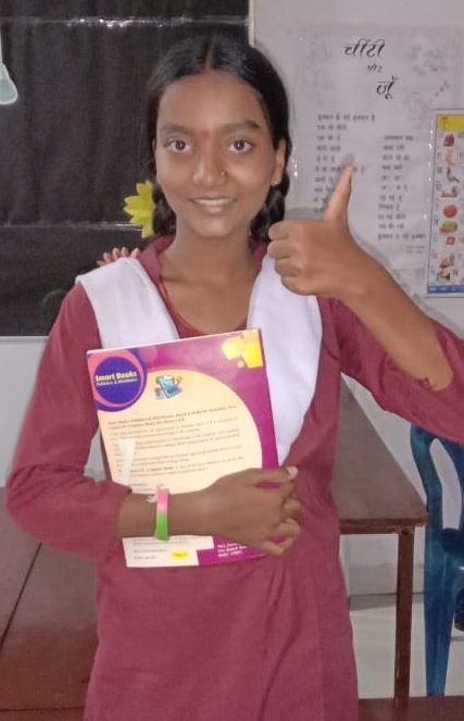 Samrisshi CFC Student Holding Book