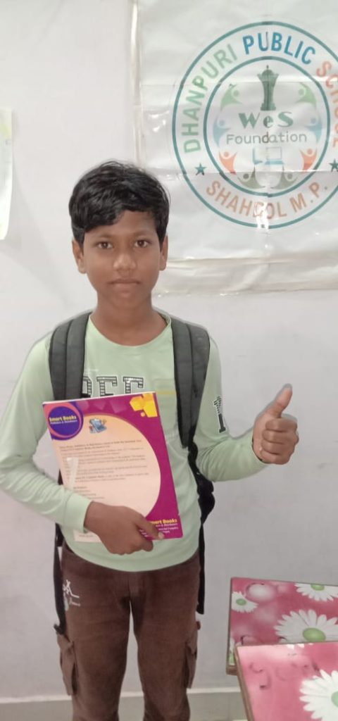 Shreyansh CFC Student Holding Book