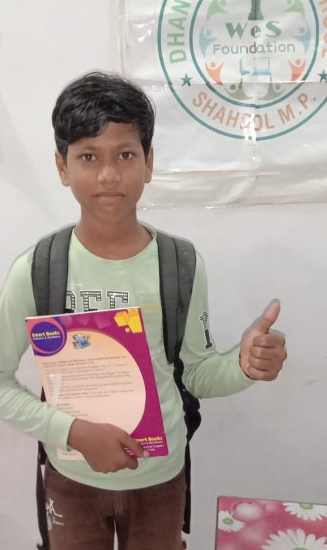 Shreyansh CFC Student Holding Book